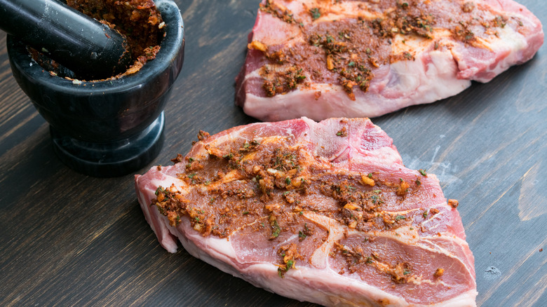 rub slathered steaks