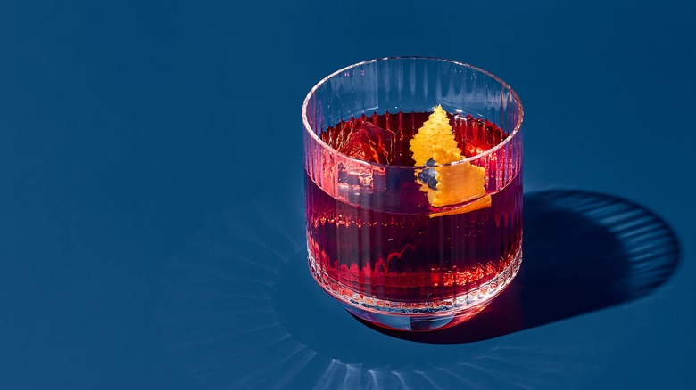 Negroni cocktail on blue background