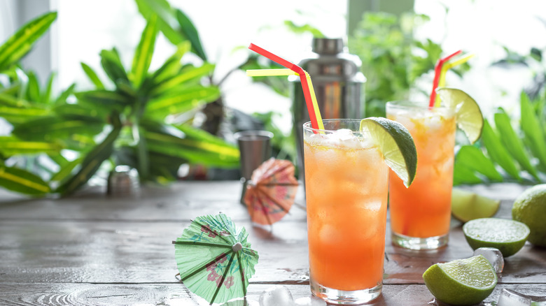 Zombie cocktails on tropical background