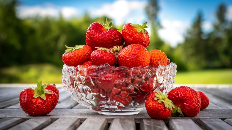 strawberries on an outdoor table