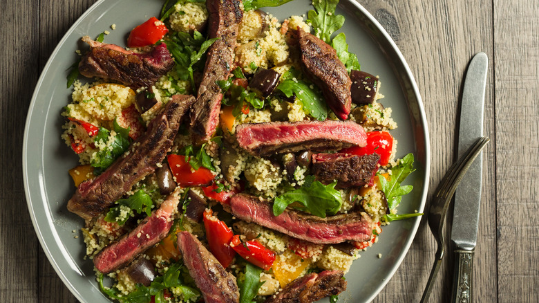 steak salad on plate