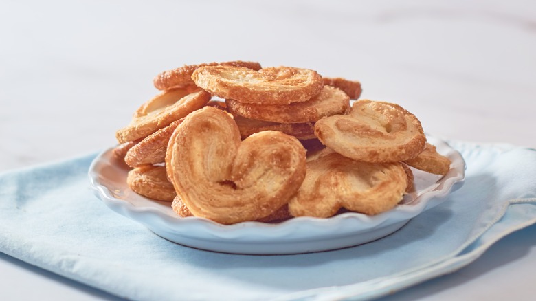 Palmier cookies on plate