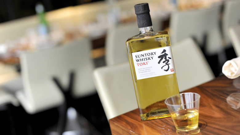 Bottle and glass of Suntory Toki whisky