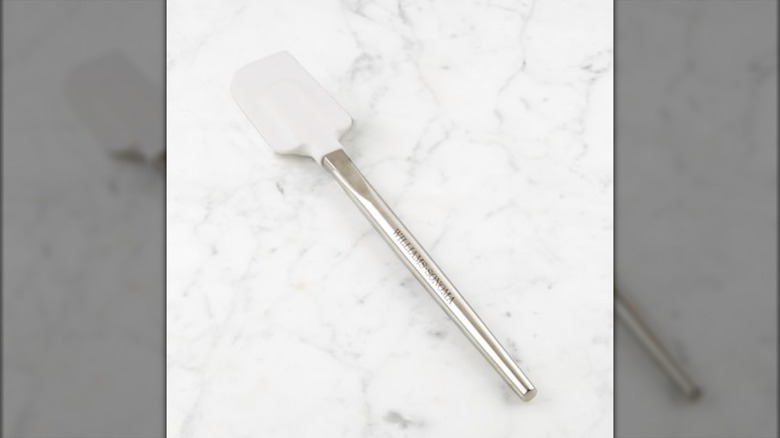 Williams Sonoma spatula on marble countertop