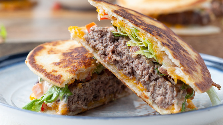 quesadilla burger halves on plate