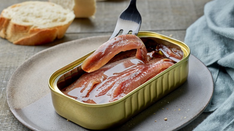 canned anchovies with baguette