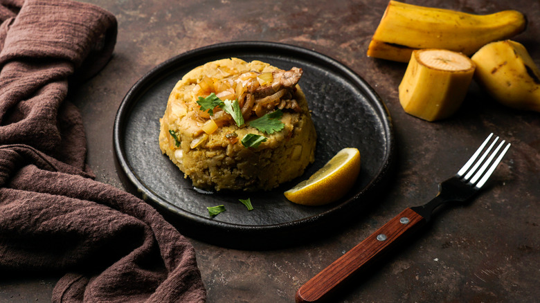 Mofongo on a black plate