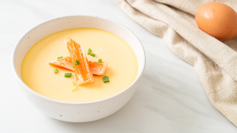 Chinese steamed egg custard in white bowl