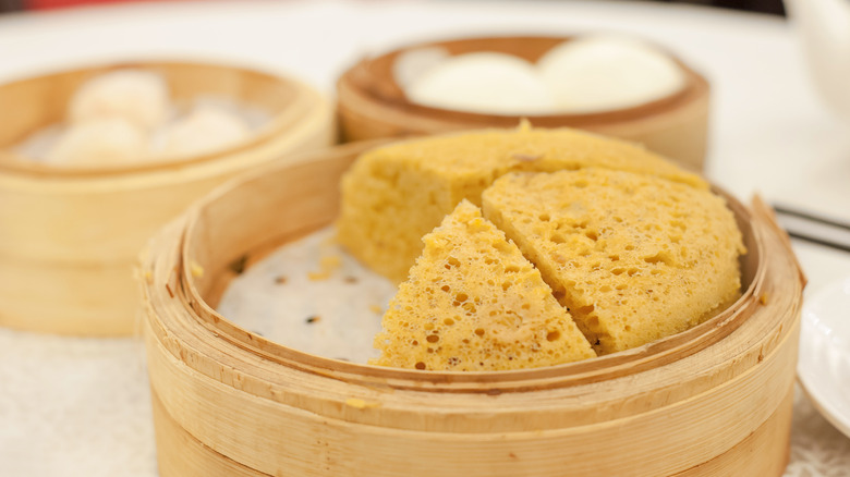 Chinese steamed sponge cake slices in bamboo basket