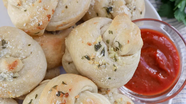 buttery garlic knots on a plate