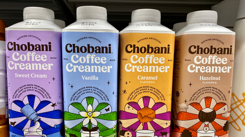 Four colorful creamer bottles
