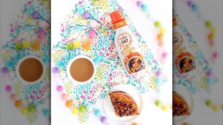 Creamer, coffee and pastry flatlay