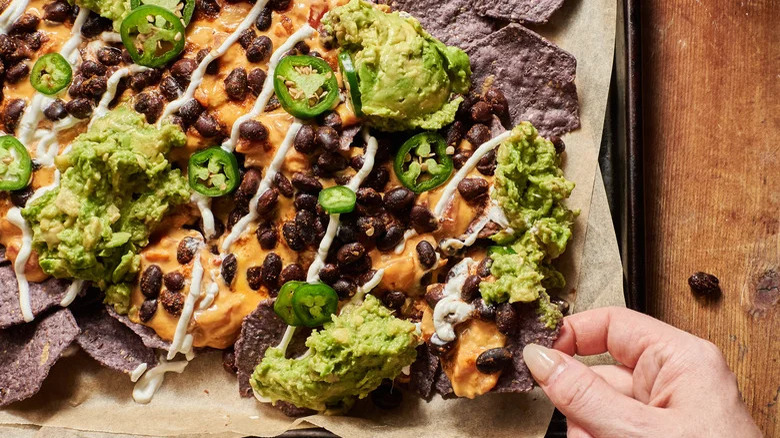 pumpkin queso nachos with guacamole