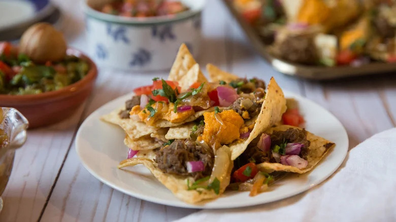 refried lentil nachos