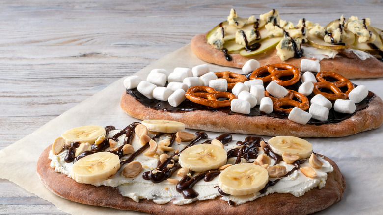 Dessert pizzas on table