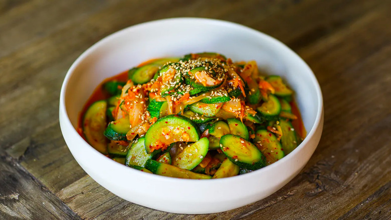 Zucchini kimchi in white bowl