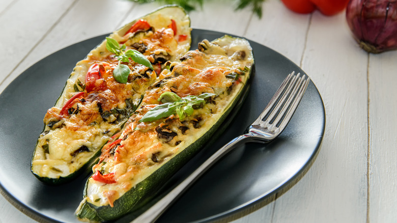 Stuffed zucchini boats on plate