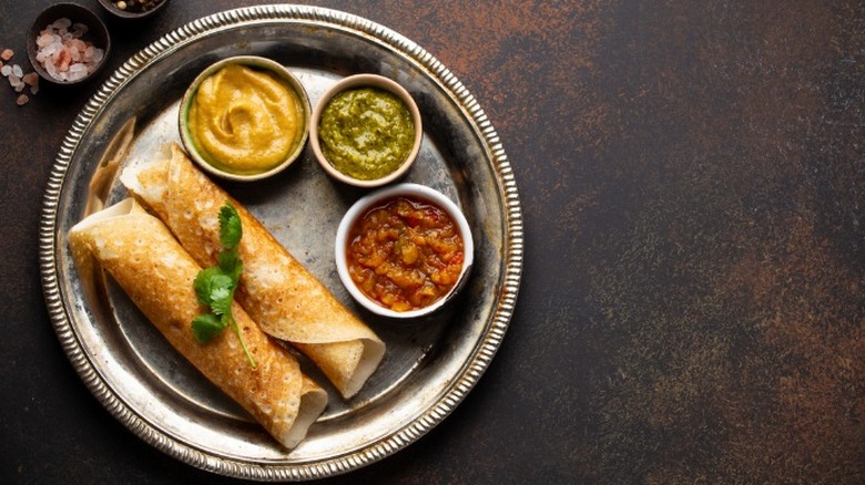 Indian dosa with different chutneys