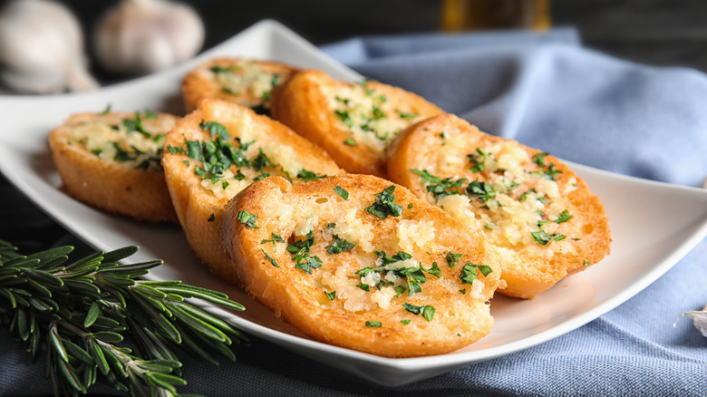 Garlic bread on plate