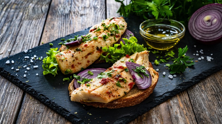 Pickled herring on toast with onion