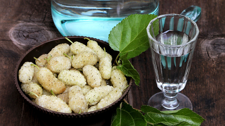 mulberries and glass of liquor