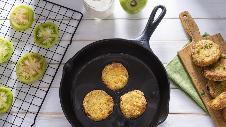 Fried green tomatoes in pan