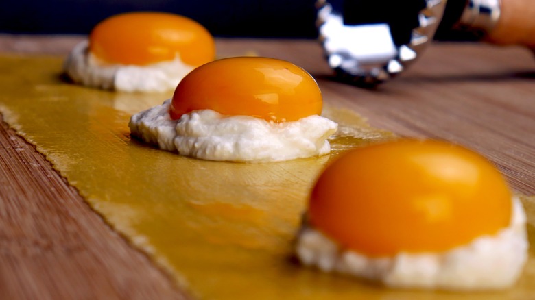 Egg yolk ravioli being made