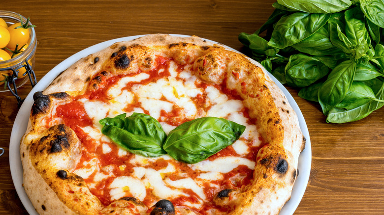 Pizza with fresh basil 