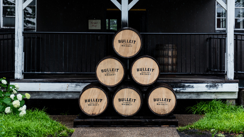 stack of Bulleit bourbon barrels