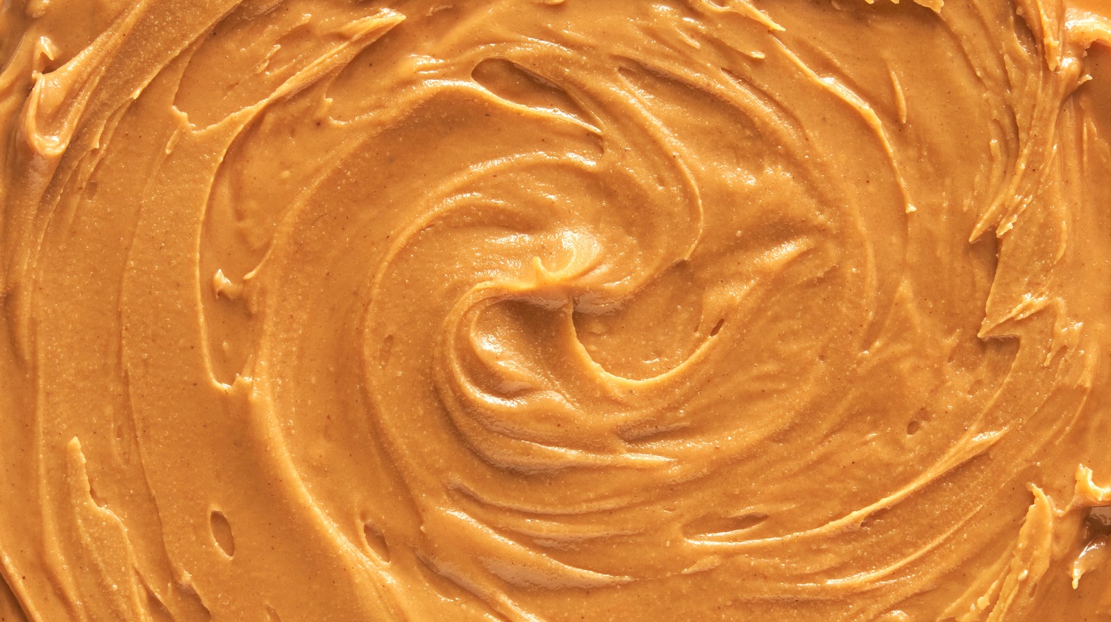 https://www.tastingtable.com/img/gallery/15-facts-about-peanut-butter-you-should-know/l-intro-1680297548.jpg