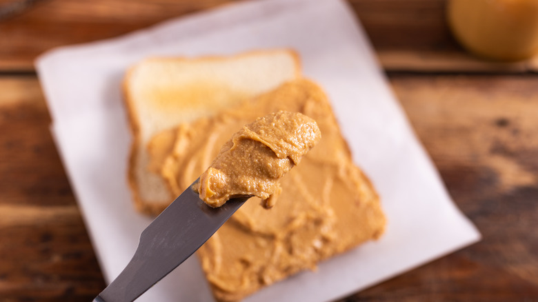 Peanut butter spread on sandwich