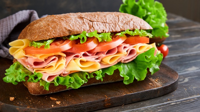 Subway sandwich with bologna, cheese, tomato, and lettuce