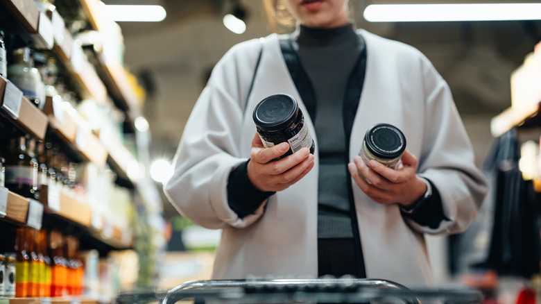 Woman looking at products at the grocery store