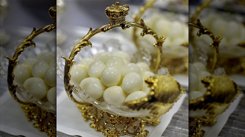 Quail eggs in gold dish