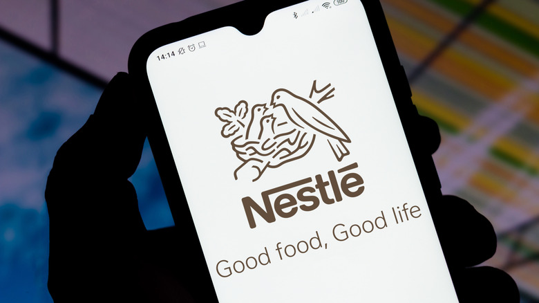 Nestlé logo on smartphone screen