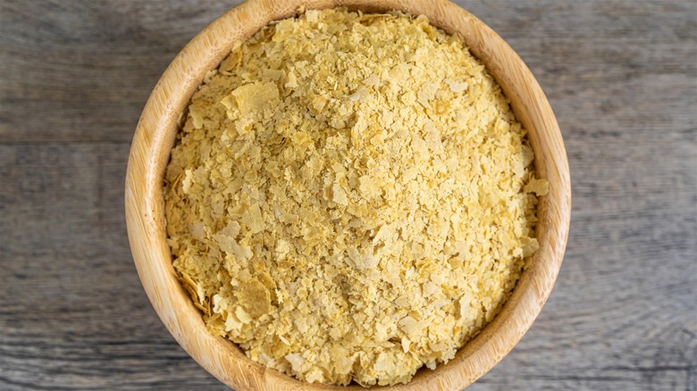 Bowl of nutritional yeast flakes