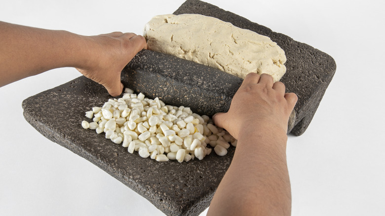 metate, mexican grindstone tool for grinding corn