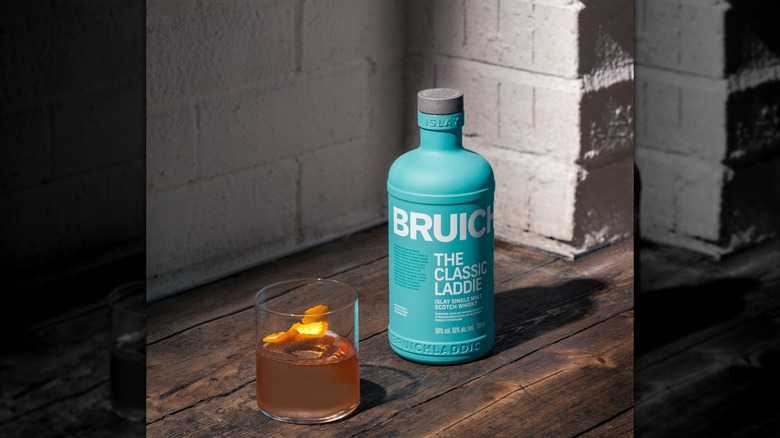 Bottle of Bruichladdich with a cocktail