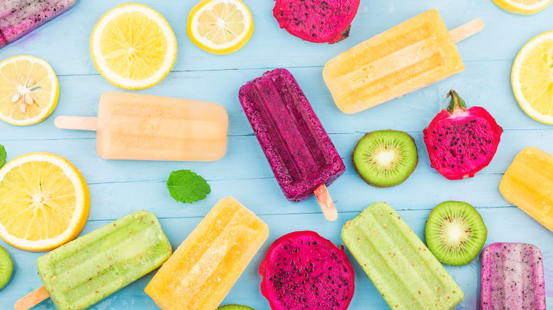 Flavored popsicles on table