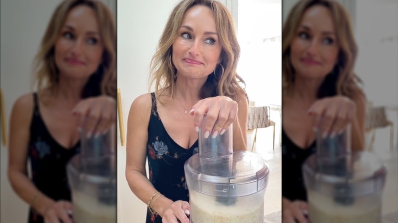 Giada De Laurentiis using a food processor for breadcrumbs