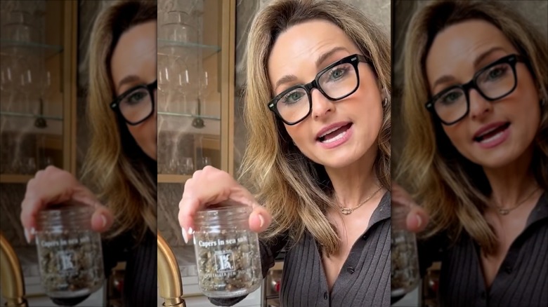 Giada De Laurentiis holding a jar of capers