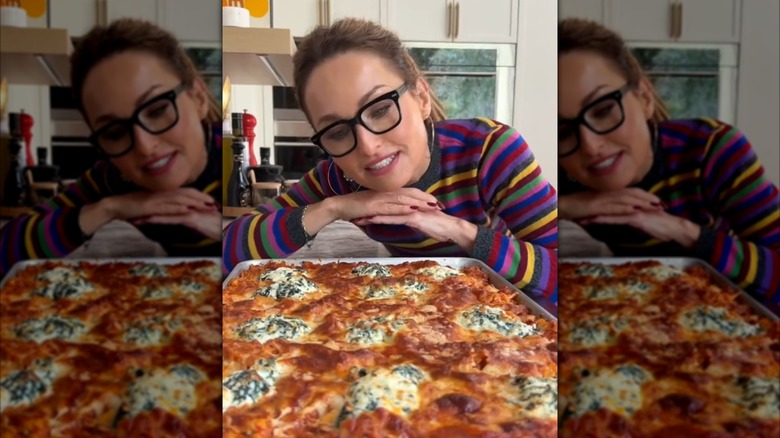 Giada de Laurentiis looking at her sheet pan lasagna