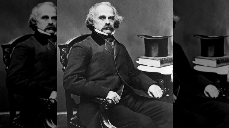 Black and white portrait of Nathaniel Hawthorne sitting in chair