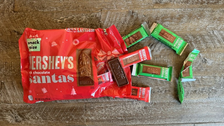 Hershey's milk chocolate Santa candies and bag on table