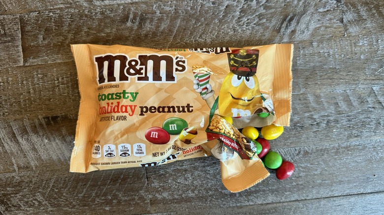 M&M's candy bag opened up on table