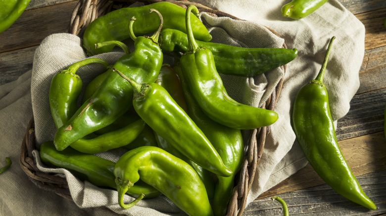 Green hatch chiles on burlap