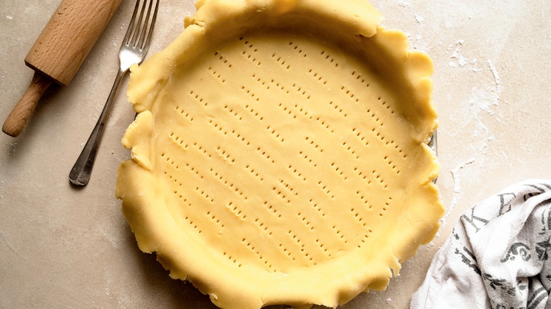 Unbaked pie crust in pan