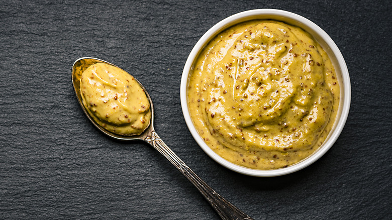 Dijon mustard in white bowl