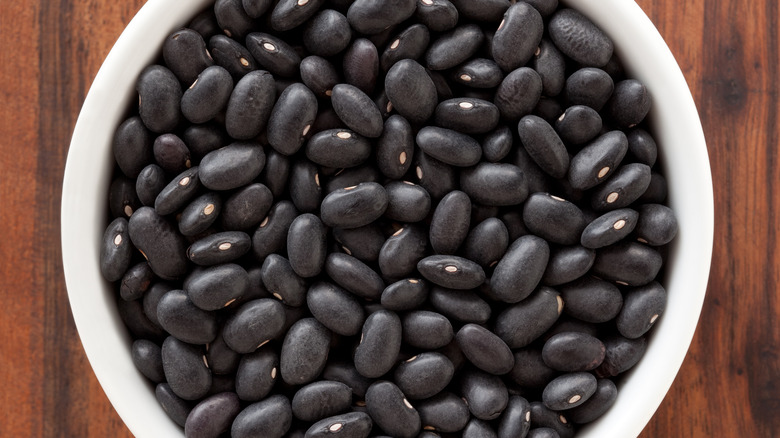 Black beans in white bowl