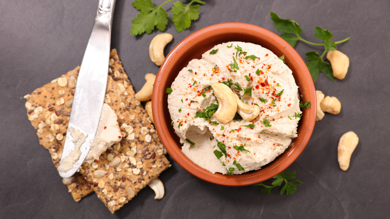 Cashew queso and multigrain cracker